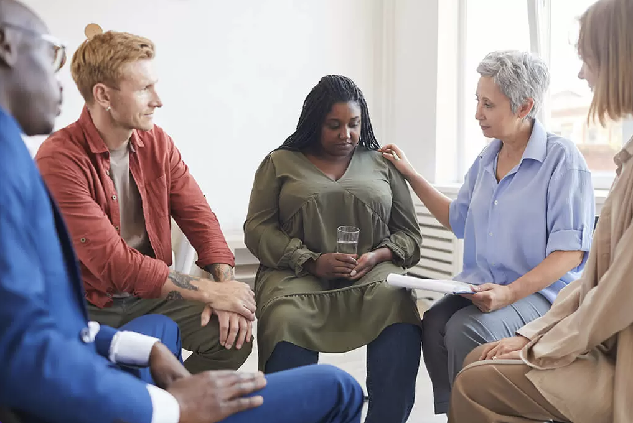 caregivers sitting together at a support group